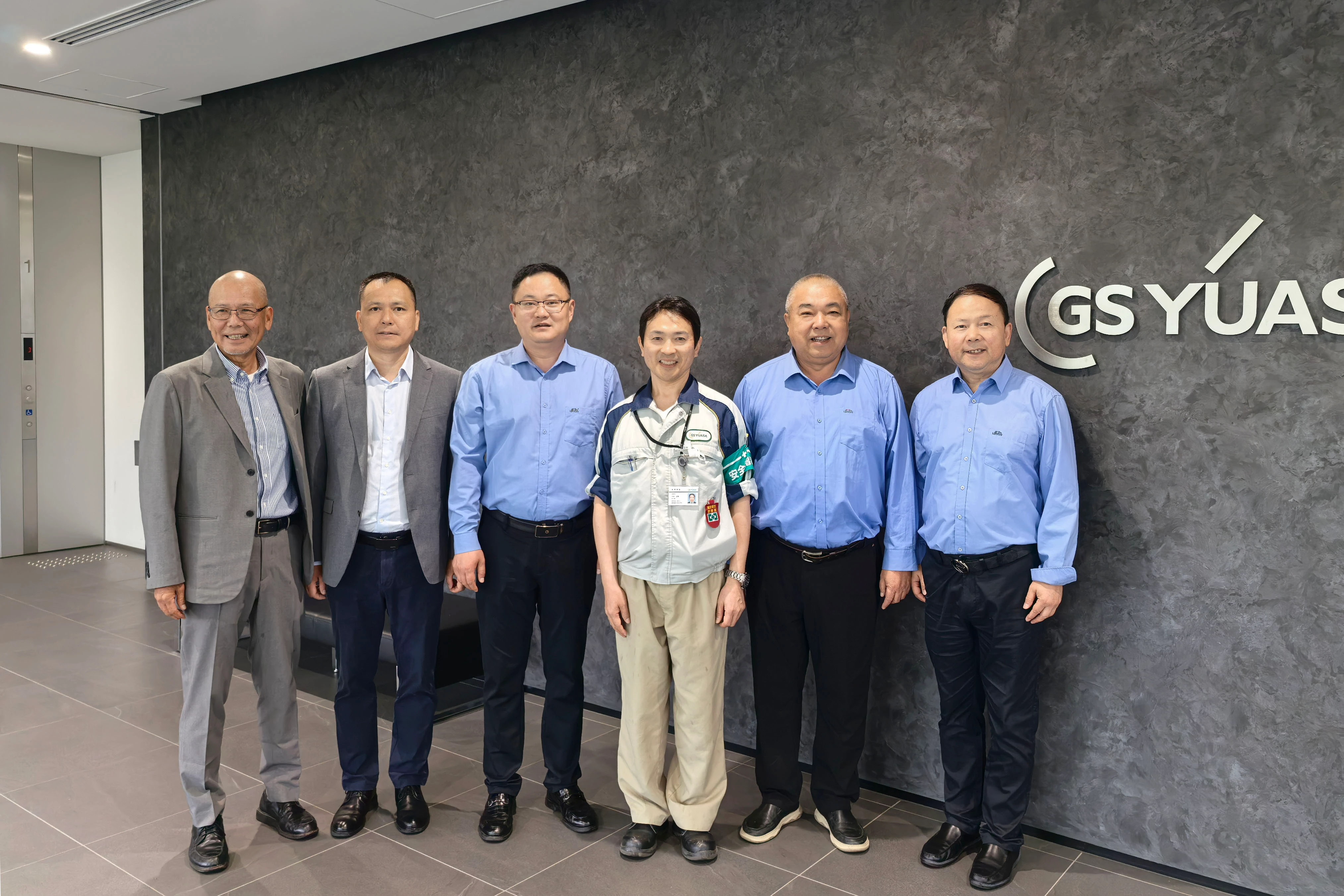 leoch team visits gs yuasa production bases.webp